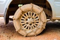 Dirty wheel with chain Royalty Free Stock Photo