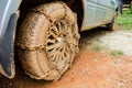 Dirty wheel with chain Royalty Free Stock Photo