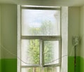 Dirty window after renovation dirtied with paint. Window needs cleaning Royalty Free Stock Photo