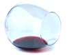 Dirty wine glass lay on white Royalty Free Stock Photo