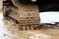 the dirty work of the excavator , which digs and leveled the ground scoops water on road repairs