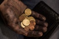 The dirty working hand holds money having pulled out from a wallet Royalty Free Stock Photo