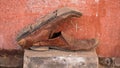 A dirty worn-out pair of boots. The old shoe is decorated as if it were the idea of sex Royalty Free Stock Photo