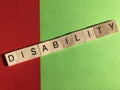 Creative Concept : the word Disability in wooden letters