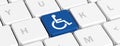 Disability, handicapped. Blue key button with wheelchair sign on a computer keyboard, banner. 3d illustration