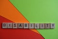 Disability, Ability, words on coloured background