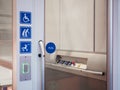 Disability signage lift facility Public accessibility Royalty Free Stock Photo