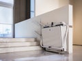 Disability stairs lift facility indoor building Wheelchair elevator Royalty Free Stock Photo