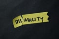 Disability to be Ability write on sticky notes isolated on office desk