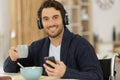 Disable man smiling while holding bowl cereals