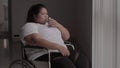 Disable overweight woman drinking drug