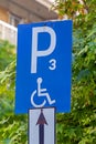 Disable parking spot sign on street