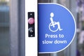 Disabled accessible push button sign at shop entrance Royalty Free Stock Photo
