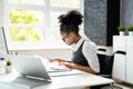 Disabled African Accountant Working On Computer Royalty Free Stock Photo