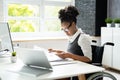 Disabled African Accountant Working On Computer Royalty Free Stock Photo