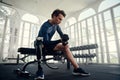 Disabled athlete doing bicep curls in the gym preparing for the Paralympics Royalty Free Stock Photo