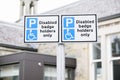 Disabled Badge Holders Only at Car Park Sign Post Royalty Free Stock Photo