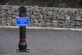 Disabled badge holders only at car park sign post suspended bay Royalty Free Stock Photo