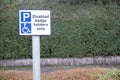 Disabled Badge Holders Only at Car Park Sign Post Royalty Free Stock Photo