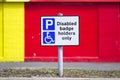 Disabled Badge Holders Only at Car Park Sign Post Royalty Free Stock Photo