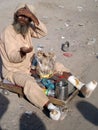 Disabled beggar begging on the street from people