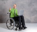 Disabled business man in wheelchair with computer Royalty Free Stock Photo