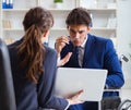 Disabled businessman having discussion with female colleague Royalty Free Stock Photo