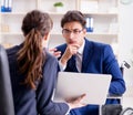 Disabled businessman having discussion with female colleague Royalty Free Stock Photo