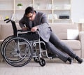 Dsabled businessman on wheelchair working home Royalty Free Stock Photo