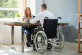 Disabled Businessman Working On Laptop Royalty Free Stock Photo