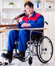 Disabled carpenter working with tools in workshop Royalty Free Stock Photo