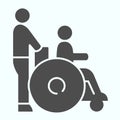 Disabled carriage solid icon. Medical transportation vector illustration isolated on white. A man pushing a wheelchair