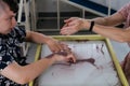 disabled child doing sensory activity with sand, rehabilitation