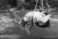 Disabled child enjoying the swing