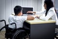 Disabled kids classroom, school boy on wheelchair with teacher, child learning and having fun during study at school Royalty Free Stock Photo