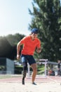 Disabled man athlete jumping with leg prosthesis. Paralympic Sport Concept. Royalty Free Stock Photo