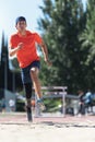 Disabled man athlete jumping with leg prosthesis. Royalty Free Stock Photo