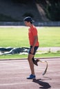 Disabled man athlete training with leg prosthesis. Royalty Free Stock Photo