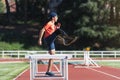 Disabled man athlete training with leg prosthesis. Royalty Free Stock Photo