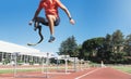 Disabled man athlete training with leg prosthesis. Royalty Free Stock Photo