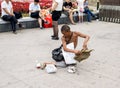 A disabled man begging in the streets of Beijing Royalty Free Stock Photo