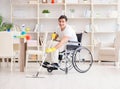 Disabled man cleaning floor at home