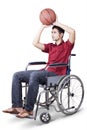 Disabled man play basketball Royalty Free Stock Photo