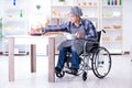 The disabled man preparing soup at kitchen Royalty Free Stock Photo