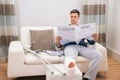 Disabled man reading newspaper Royalty Free Stock Photo