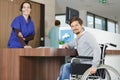 disabled man sitting in wheelchair waiting for hospitalization Royalty Free Stock Photo