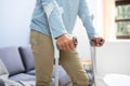 Disabled Man Using Crutches To Walk Royalty Free Stock Photo
