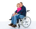 Disabled man in weelchair with his daughter Royalty Free Stock Photo