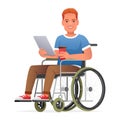 Disabled man in a wheelchair holds a tablet and a glass of coffee. A man sits in a wheelchair and works on a tablet. Disabled man