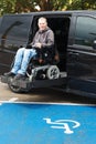 Disabled man on wheelchair lift